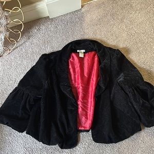 a black & red coverup jacket